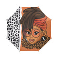 Orange and black and white pattern accents, full-size polyester umbrella featuring an elegant Afrocentric illustration of a woman with long loc’d hair, gold-toned accents, luxury-inspired graphic pattern, semi-automatic open canopy, and straight handle