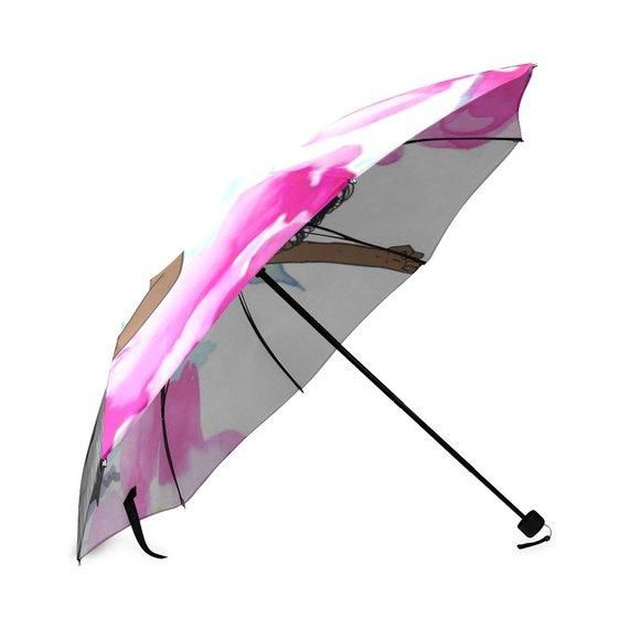 side view of black girls rock pink umbrella